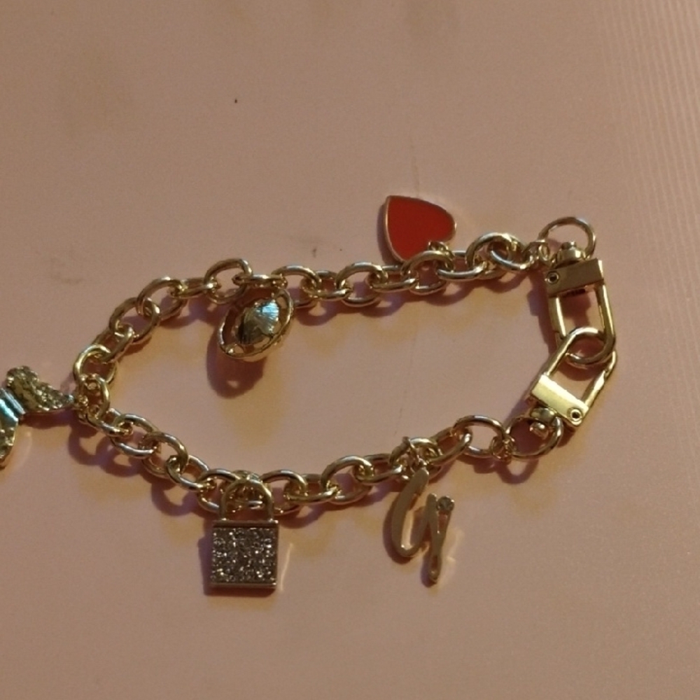 G by Guess Gold and Red Charm Bracelet